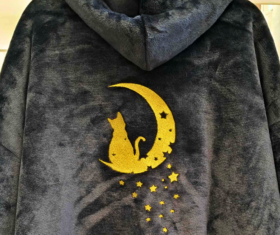 Tikandiga ponšo täiskasvanutele. Unisex